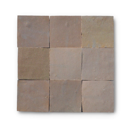 Soft grey-brown zellige tile with matte texture and handcrafted surface. Slight tone variation expected. Suitable for interior wall applications.


